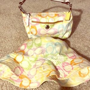 Matching coach rain hat and purse